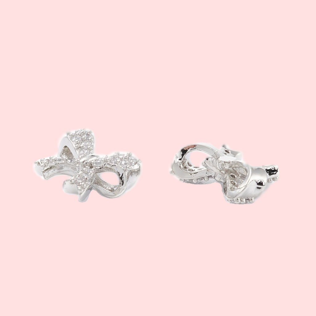 Silver Cubic Zirconia Bow Huggies!