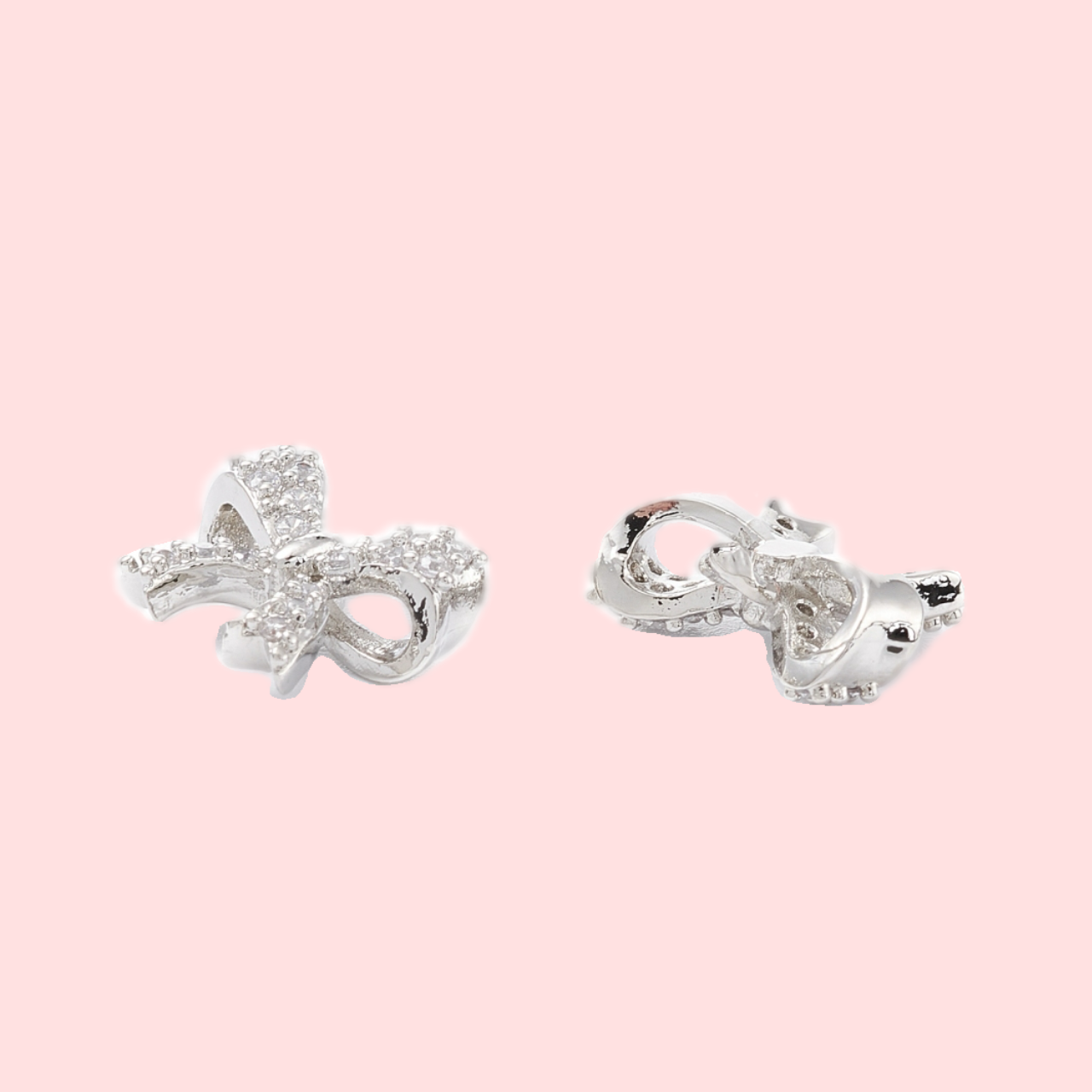 Silver Cubic Zirconia Bow Huggies!