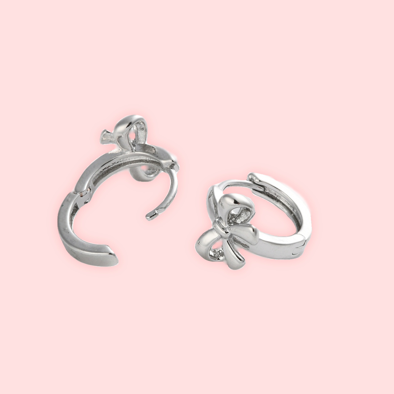 Silver Bow Knot Huggies!